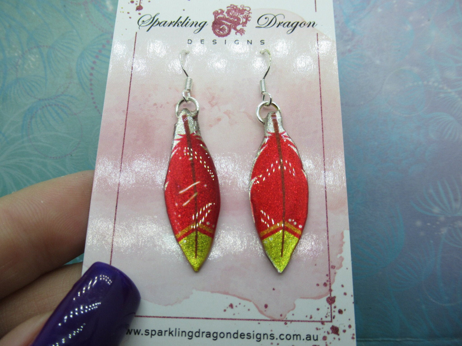Pretty Feather Earrings - New Age Boho gift - Lovely Red, Yellow and an Orange Stripe Colours in Resin with Glitter Finish