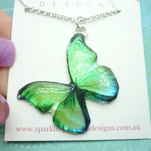 Butterfly Necklace Yellowy Green, a Little Blue on Sparkle Silver Plated Chain - Fairy Jewellery, Fun Gift for her Resin with Glitter Finish