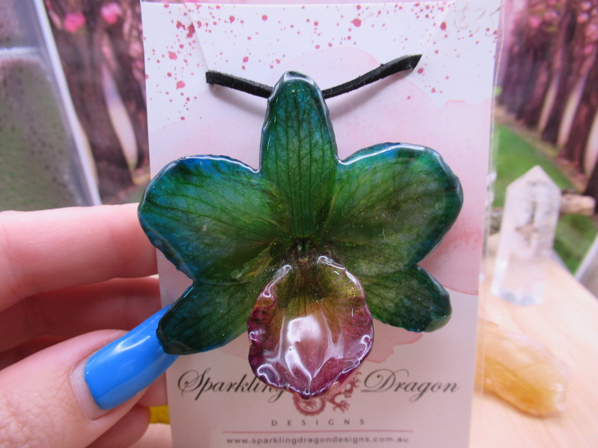 Real Orchid Flower Necklace - Translucent Mermaid Green. This is a REAL Orchid flower preserved in resin, making a unique necklace