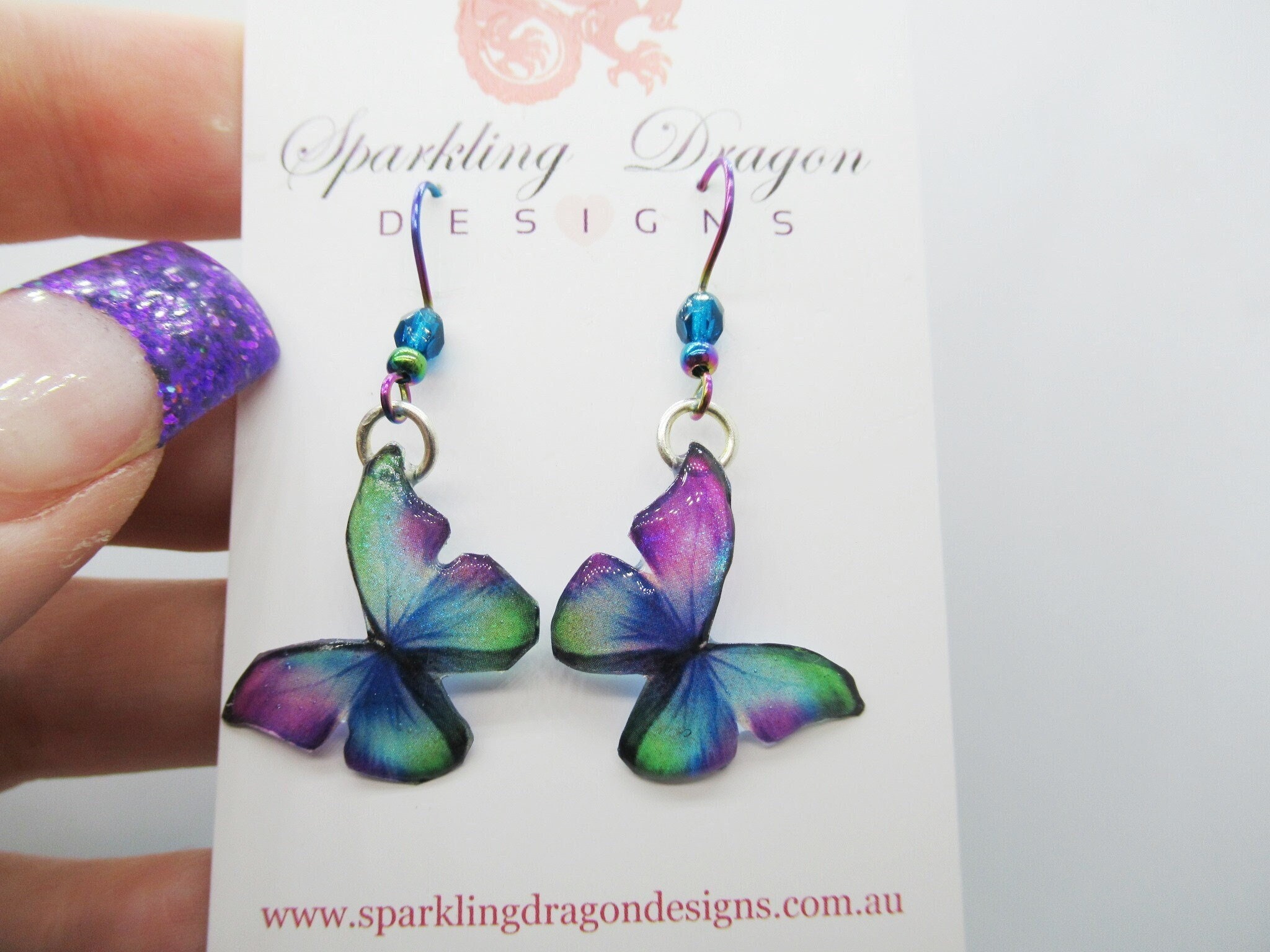 Little butterfly earrings green, blue, purple with bead - fairy jewellery, fairy wing earrings - sparkly - resin with glitter finish