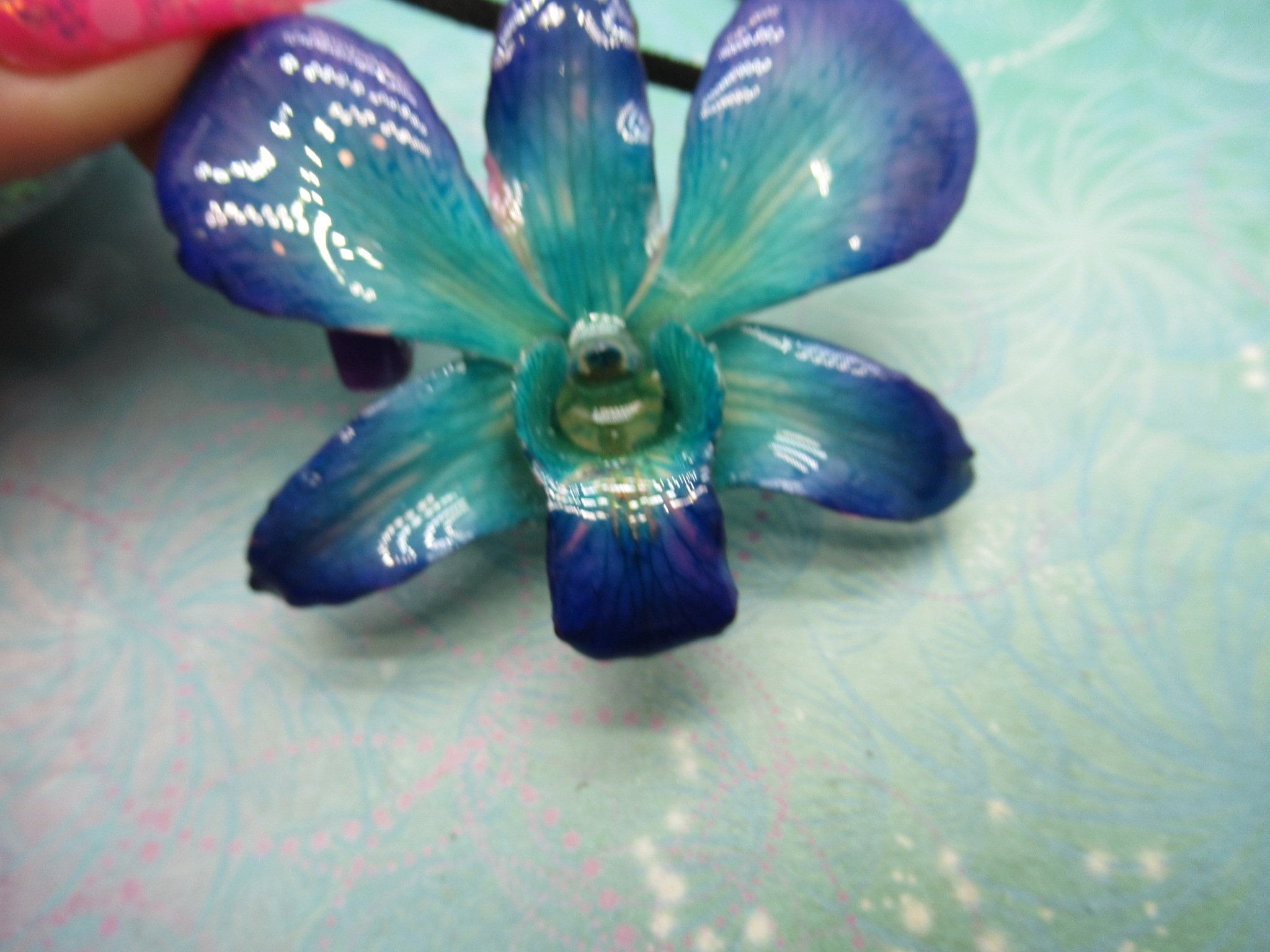 Real Orchid Flower Necklace - Cyan/Blue/Purple. This is a REAL Orchid flower which has been preserved in resin making a unique necklace - Image 4