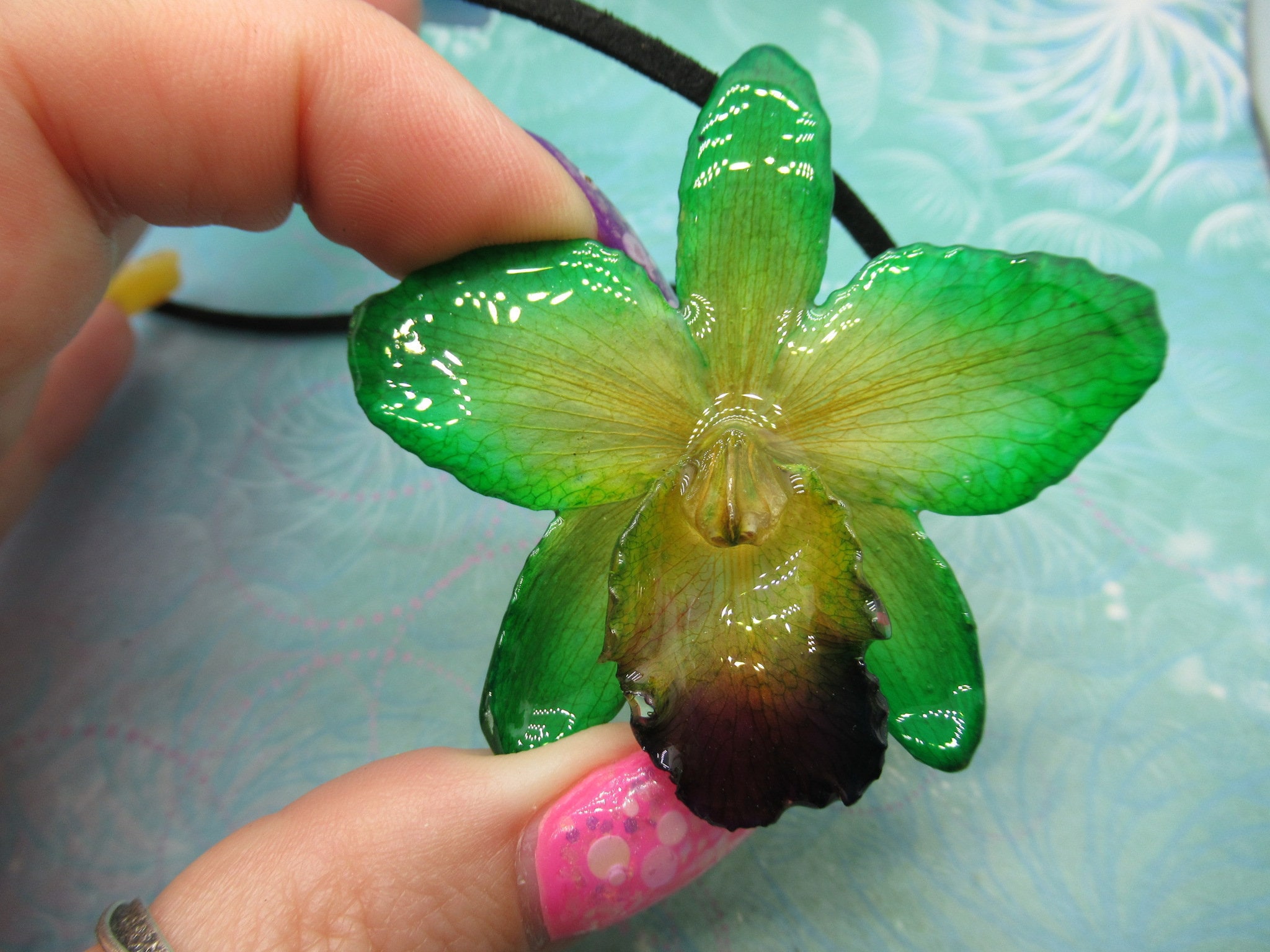Real Orchid Flower Necklace - BlueGreen/Yellow/Purple. This is a REAL Orchid flower preserved in resin making a unique necklace