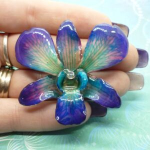 Real Orchid Flower Necklace - Cyan/Blue/Purple. This is a REAL Orchid flower which has been preserved in resin making a unique necklace